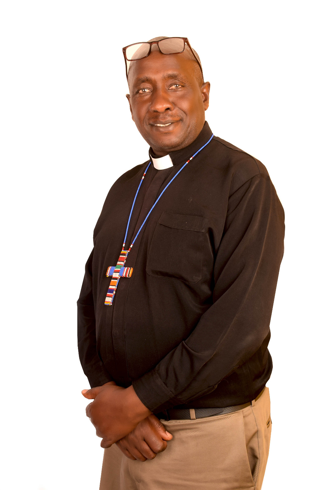 Pastor preaching to congregation at PCEA Miracle Church